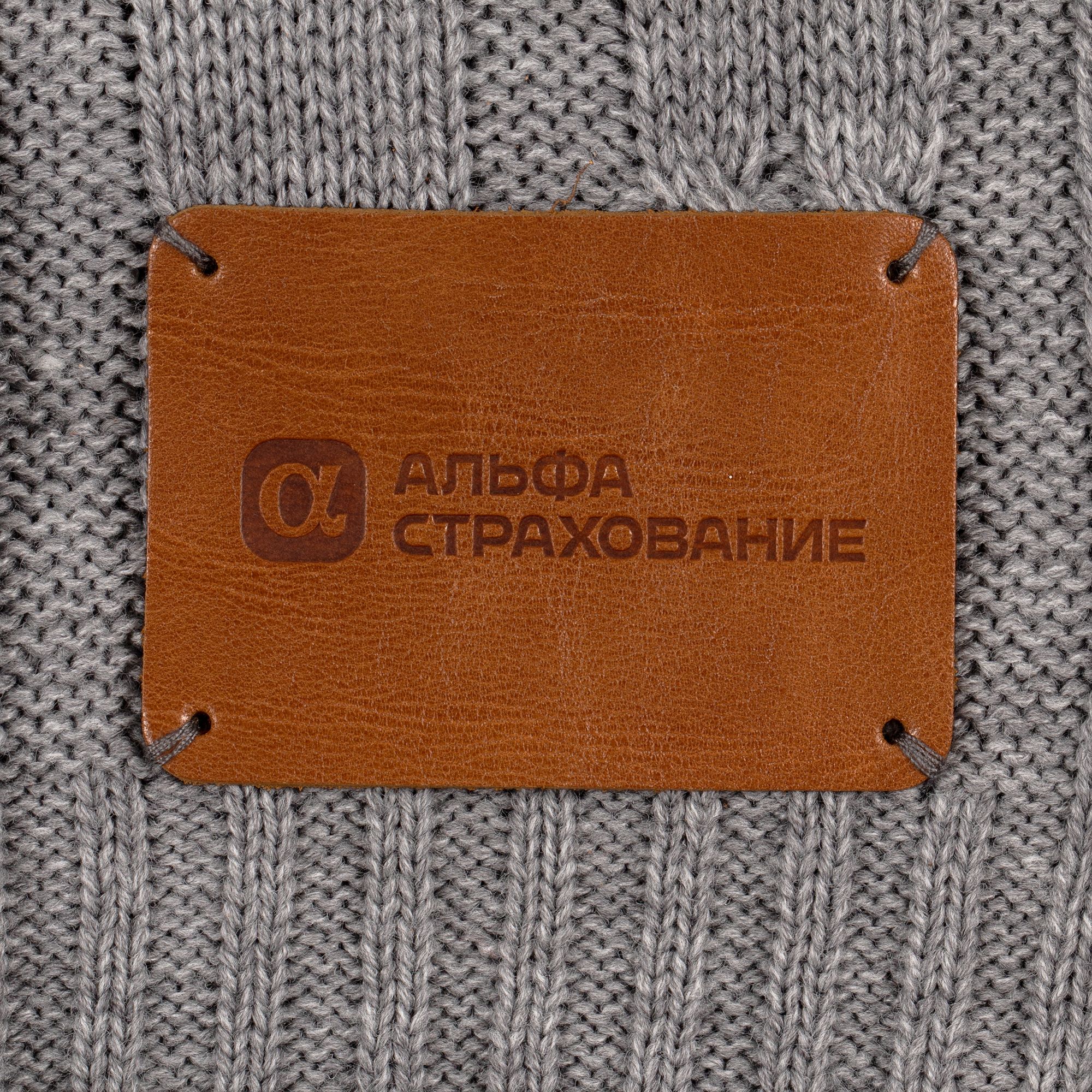 Тиснение с пришивом лейбла